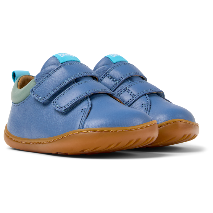 Scarpe in pelle blu, Peu primi passi