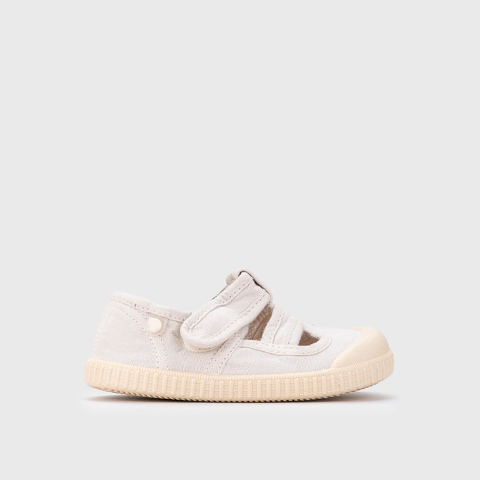 Open canvas shoes barefoot concept, Ice