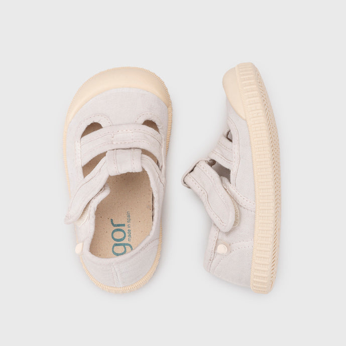 Open canvas shoes barefoot concept, Ice