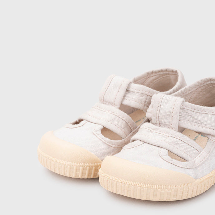 Open canvas shoes barefoot concept, Ice