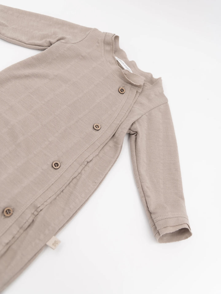 Side opening playsuit with organic bamboo feet, Sand
