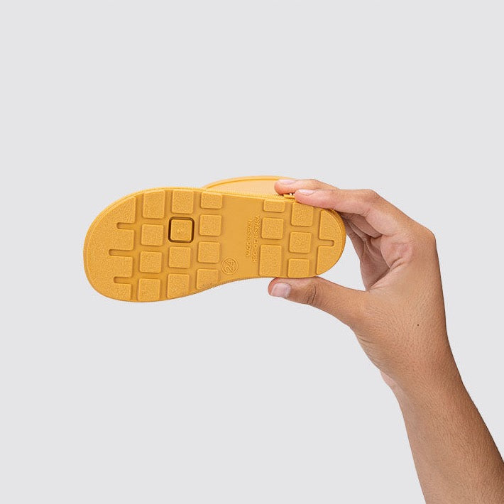 Yellow rubber rain boots
