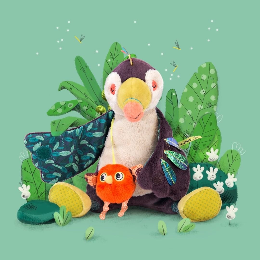 Moulin Roty | Peluche musicale carillon Tucano, Dans la Jungle